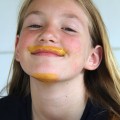 girl with pumpkin mustache