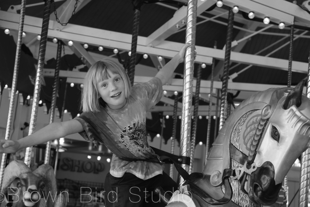 girl on carousel