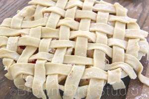 Continue doing this until your pie is covered with a woven beautiful pattern of dough strips. It sounds complicated, but once you try it, you'll realize it's easy.