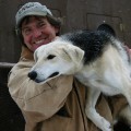 Photo of Musher Handling his Dog